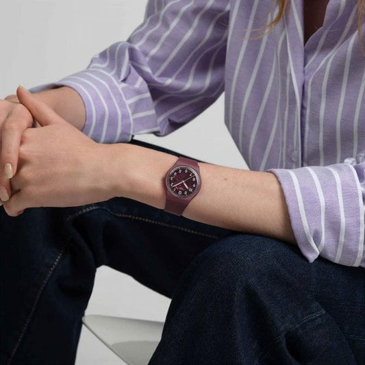 SWATCH ESSENTIALS THRU THE CROWN GLASS