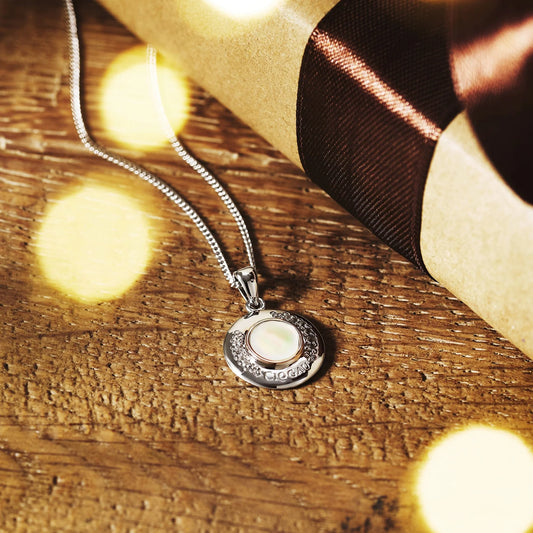 Celebration Sterling Silver Pendant with Mother of Pearl & Topaz