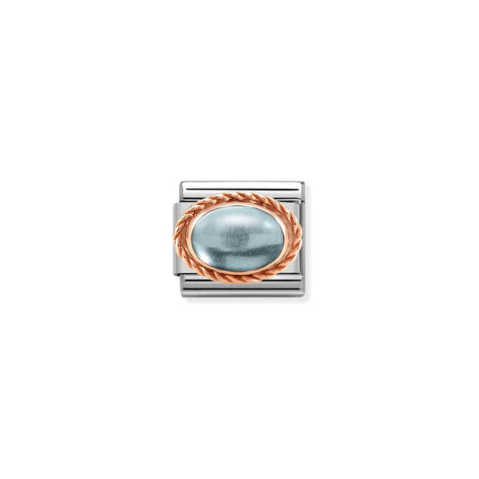 Rose gold oval light blue topaz